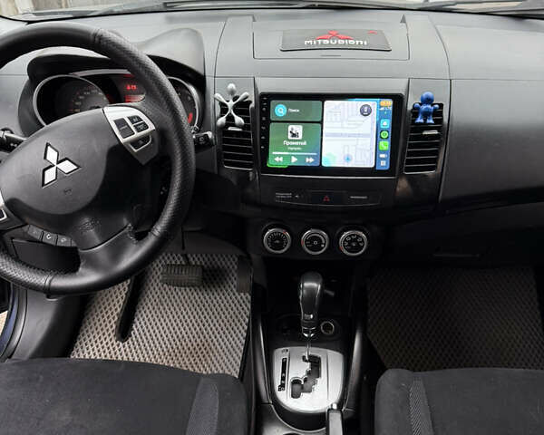 Синий Мицубиси Аутлендер, объемом двигателя 2.36 л и пробегом 269 тыс. км за 7500 $, фото 7 на Automoto.ua