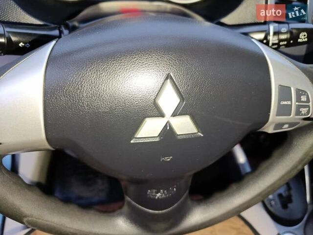 Синий Мицубиси Аутлендер, объемом двигателя 2.4 л и пробегом 264 тыс. км за 7555 $, фото 15 на Automoto.ua