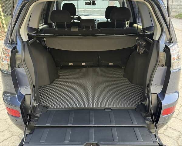 Синий Мицубиси Аутлендер, объемом двигателя 2.36 л и пробегом 223 тыс. км за 8650 $, фото 11 на Automoto.ua