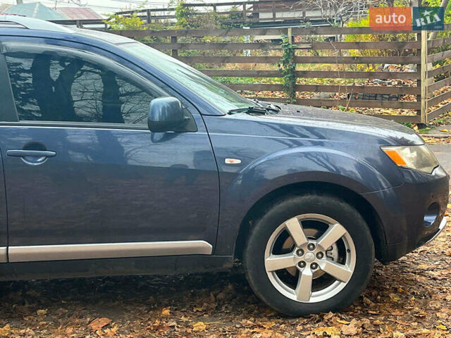 Синій Міцубісі Аутлендер, об'ємом двигуна 2.4 л та пробігом 211 тис. км за 8390 $, фото 15 на Automoto.ua