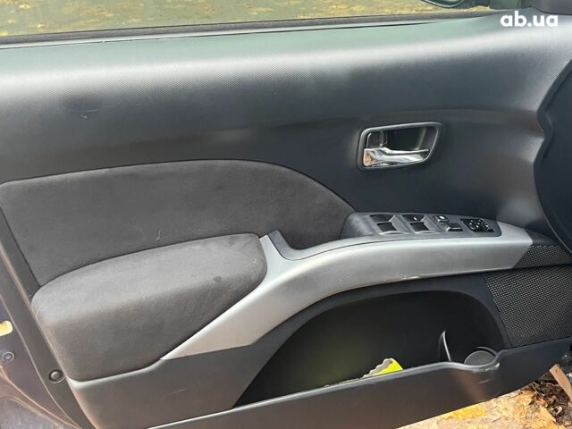 Синій Міцубісі Аутлендер, об'ємом двигуна 2.4 л та пробігом 211 тис. км за 8390 $, фото 27 на Automoto.ua