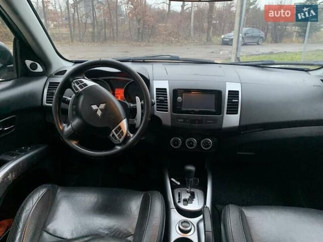Синий Мицубиси Аутлендер, объемом двигателя 3 л и пробегом 383 тыс. км за 9000 $, фото 10 на Automoto.ua