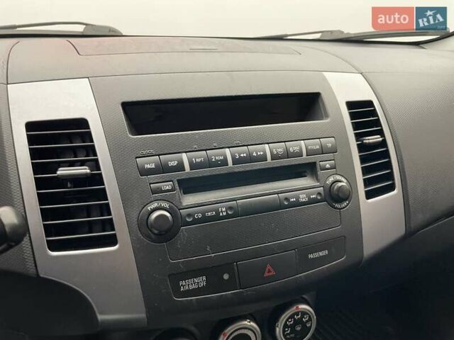 Синій Міцубісі Аутлендер, об'ємом двигуна 2.4 л та пробігом 126 тис. км за 10438 $, фото 14 на Automoto.ua