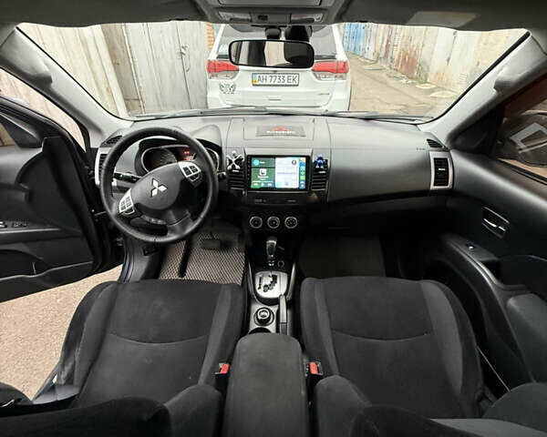 Синий Мицубиси Аутлендер, объемом двигателя 2.36 л и пробегом 269 тыс. км за 7500 $, фото 9 на Automoto.ua