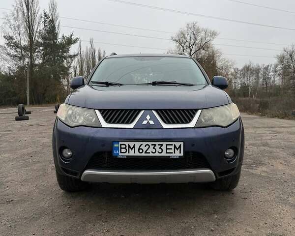 Синий Мицубиси Аутлендер, объемом двигателя 2.4 л и пробегом 211 тыс. км за 7800 $, фото 26 на Automoto.ua