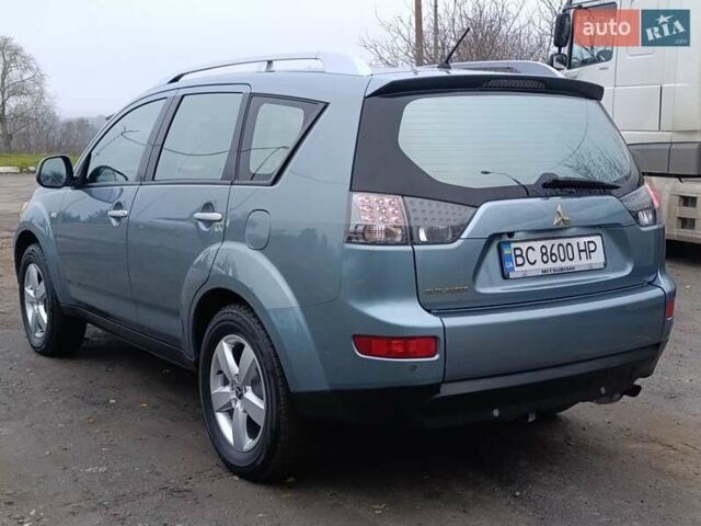 Синий Мицубиси Аутлендер, объемом двигателя 2.4 л и пробегом 264 тыс. км за 7555 $, фото 6 на Automoto.ua