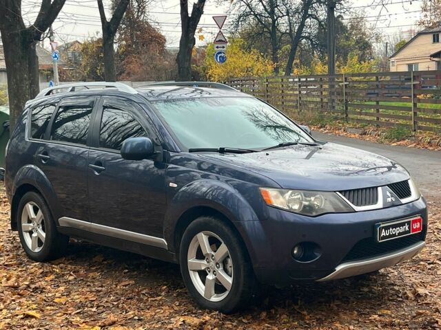 Синій Міцубісі Аутлендер, об'ємом двигуна 2.4 л та пробігом 211 тис. км за 8390 $, фото 2 на Automoto.ua