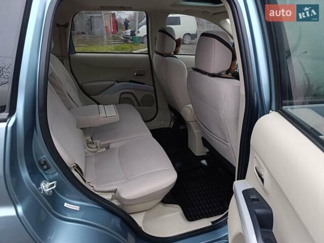 Синий Мицубиси Аутлендер, объемом двигателя 2.4 л и пробегом 264 тыс. км за 7555 $, фото 34 на Automoto.ua