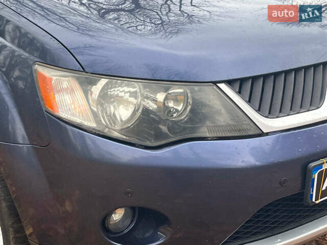 Синій Міцубісі Аутлендер, об'ємом двигуна 2.4 л та пробігом 211 тис. км за 8390 $, фото 2 на Automoto.ua