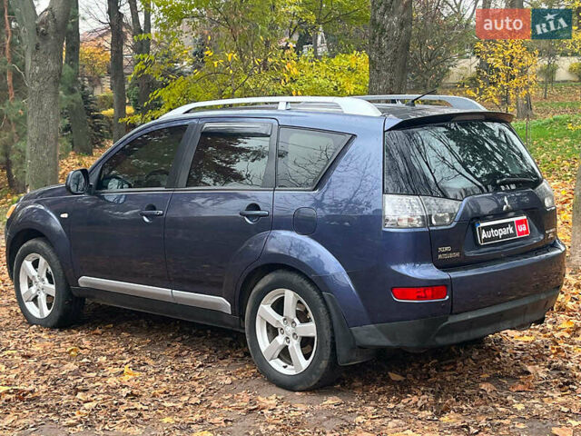 Синій Міцубісі Аутлендер, об'ємом двигуна 2.4 л та пробігом 211 тис. км за 8390 $, фото 7 на Automoto.ua