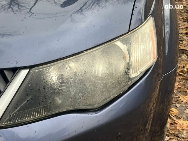 Синій Міцубісі Аутлендер, об'ємом двигуна 2.4 л та пробігом 211 тис. км за 8390 $, фото 4 на Automoto.ua