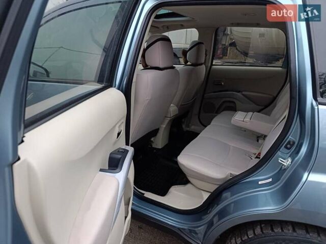 Синий Мицубиси Аутлендер, объемом двигателя 2.4 л и пробегом 264 тыс. км за 7555 $, фото 36 на Automoto.ua