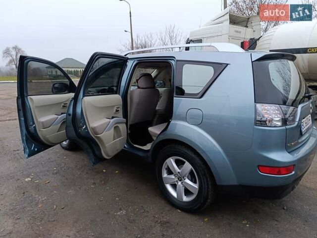 Синий Мицубиси Аутлендер, объемом двигателя 2.4 л и пробегом 264 тыс. км за 7555 $, фото 14 на Automoto.ua