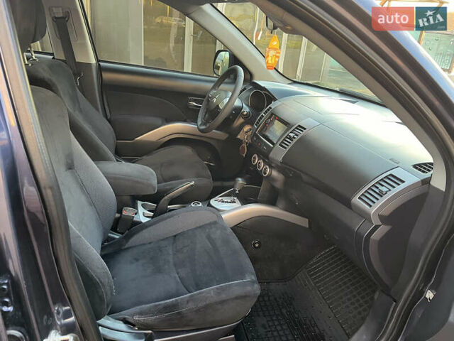 Міцубісі Аутлендер 2008 у Хусте на Automoto.ua Синій Міцубісі Аутлендер, об'ємом двигуна 2.4 л та пробігом 246 тис. км за 7950 $, фото 9 на Automoto.ua
