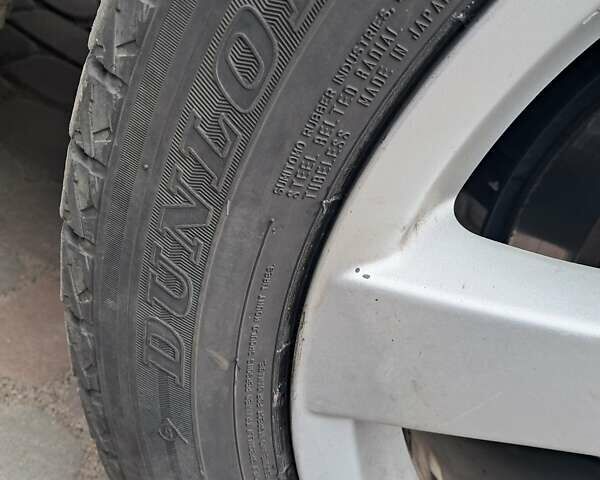 Синий Мицубиси Аутлендер, объемом двигателя 2.4 л и пробегом 160 тыс. км за 8800 $, фото 3 на Automoto.ua