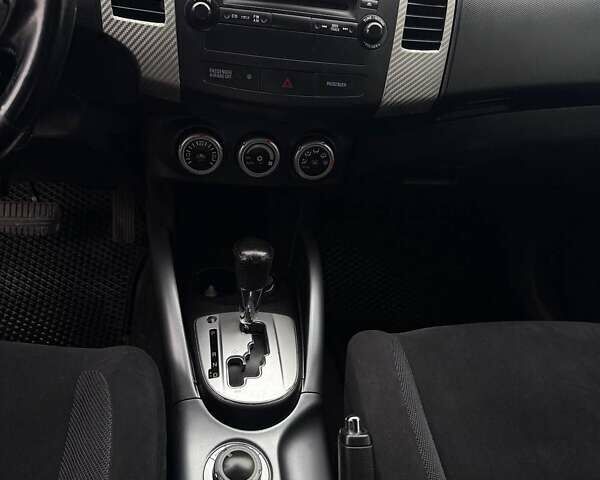 Синий Мицубиси Аутлендер, объемом двигателя 2.4 л и пробегом 211 тыс. км за 7800 $, фото 15 на Automoto.ua