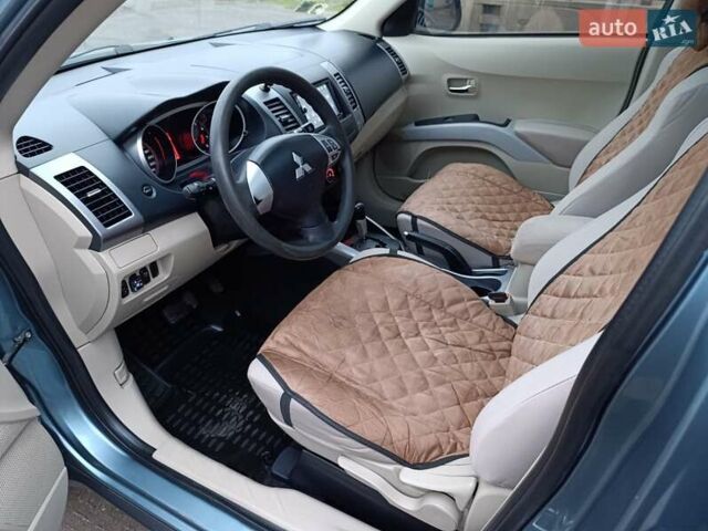 Синий Мицубиси Аутлендер, объемом двигателя 2.4 л и пробегом 264 тыс. км за 7555 $, фото 21 на Automoto.ua
