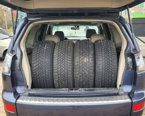 Синий Мицубиси Аутлендер, объемом двигателя 3 л и пробегом 270 тыс. км за 7900 $, фото 6 на Automoto.ua