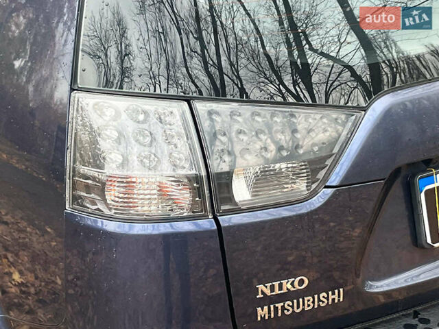 Синій Міцубісі Аутлендер, об'ємом двигуна 2.4 л та пробігом 211 тис. км за 8390 $, фото 11 на Automoto.ua