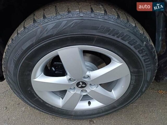 Синий Мицубиси Аутлендер, объемом двигателя 2.4 л и пробегом 264 тыс. км за 7555 $, фото 42 на Automoto.ua