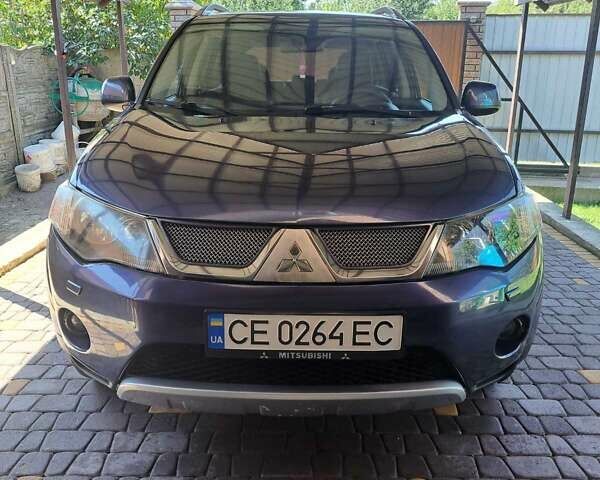 Синий Мицубиси Аутлендер, объемом двигателя 2.18 л и пробегом 205 тыс. км за 11000 $, фото 10 на Automoto.ua