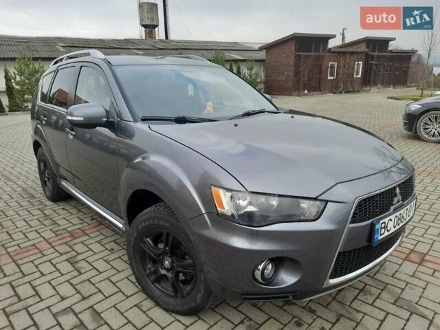 Синий Мицубиси Аутлендер, объемом двигателя 2 л и пробегом 200 тыс. км за 10500 $, фото 16 на Automoto.ua