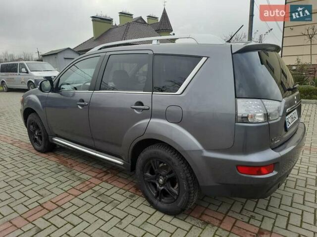 Синий Мицубиси Аутлендер, объемом двигателя 2 л и пробегом 200 тыс. км за 10500 $, фото 8 на Automoto.ua