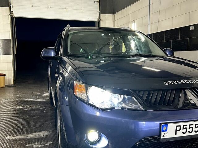 Синий Мицубиси Аутлендер, объемом двигателя 2.4 л и пробегом 284 тыс. км за 9250 $, фото 8 на Automoto.ua