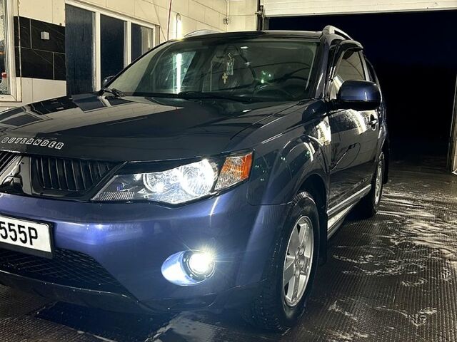 Синий Мицубиси Аутлендер, объемом двигателя 2.4 л и пробегом 284 тыс. км за 9250 $, фото 9 на Automoto.ua