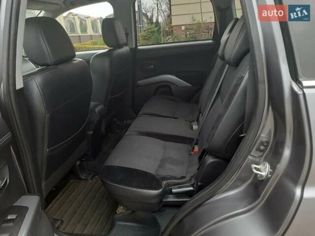 Синий Мицубиси Аутлендер, объемом двигателя 2 л и пробегом 200 тыс. км за 10500 $, фото 22 на Automoto.ua