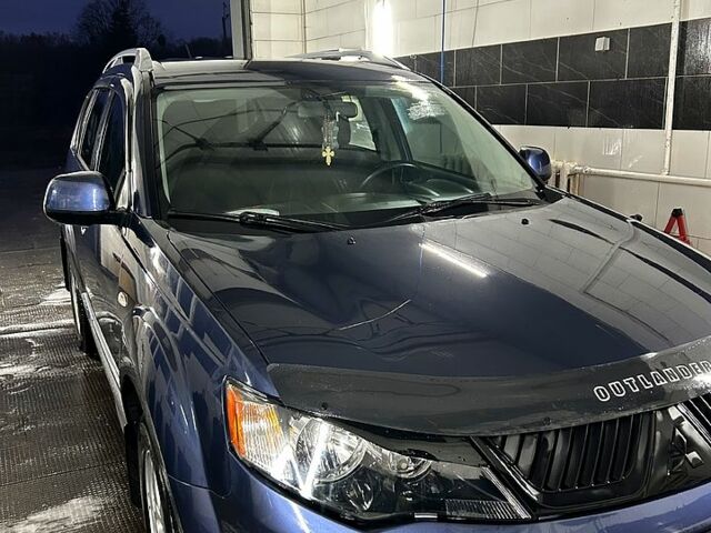 Синий Мицубиси Аутлендер, объемом двигателя 2.4 л и пробегом 284 тыс. км за 9250 $, фото 10 на Automoto.ua