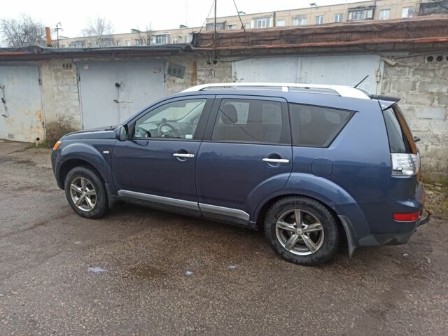 Синий Мицубиси Аутлендер, объемом двигателя 2 л и пробегом 306 тыс. км за 5200 $, фото 7 на Automoto.ua