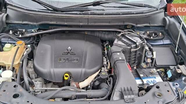 Мицубиси Аутлендер 2009 в Коломые на Automoto.ua Синий Мицубиси Аутлендер, объемом двигателя 2.2 л и пробегом 250 тыс. км за 9900 $, фото 6 на Automoto.ua