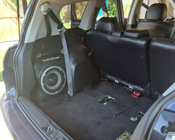 Синий Мицубиси Аутлендер, объемом двигателя 2.18 л и пробегом 205 тыс. км за 11000 $, фото 9 на Automoto.ua