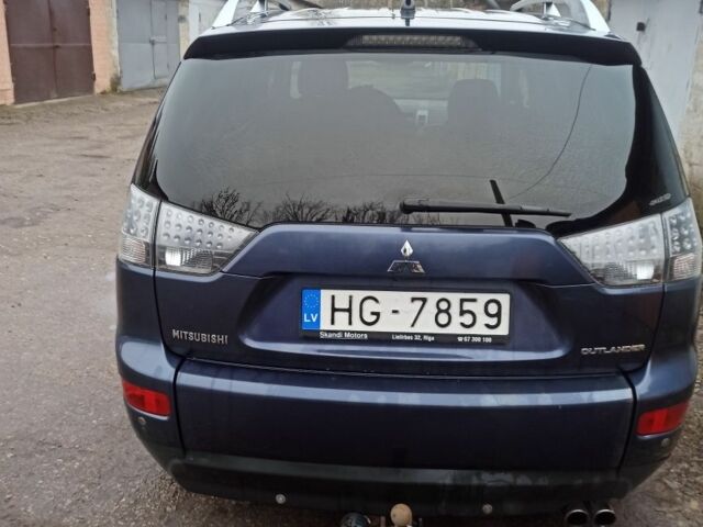 Синий Мицубиси Аутлендер, объемом двигателя 2 л и пробегом 306 тыс. км за 5200 $, фото 5 на Automoto.ua