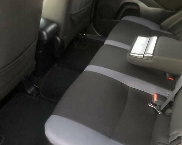 Синий Мицубиси Аутлендер, объемом двигателя 2 л и пробегом 235 тыс. км за 8800 $, фото 4 на Automoto.ua