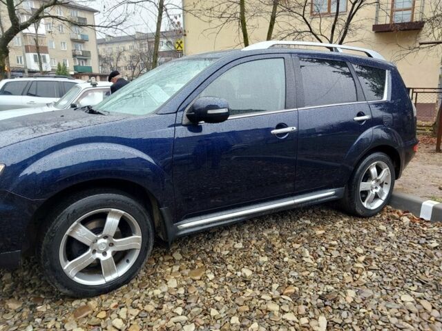 Синий Мицубиси Аутлендер, объемом двигателя 2.2 л и пробегом 220 тыс. км за 11450 $, фото 2 на Automoto.ua