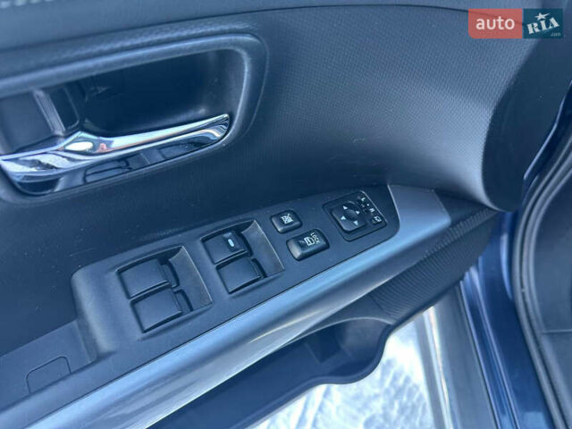 Синий Мицубиси Аутлендер, объемом двигателя 2 л и пробегом 257 тыс. км за 10500 $, фото 22 на Automoto.ua