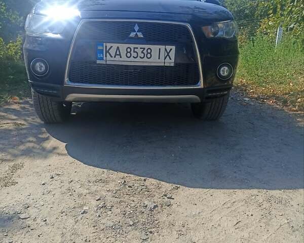 Синий Мицубиси Аутлендер, объемом двигателя 2.18 л и пробегом 223 тыс. км за 11200 $, фото 21 на Automoto.ua