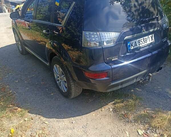 Синий Мицубиси Аутлендер, объемом двигателя 2.18 л и пробегом 223 тыс. км за 11200 $, фото 8 на Automoto.ua