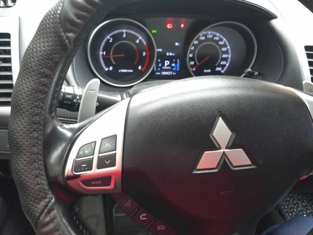 Синий Мицубиси Аутлендер, объемом двигателя 2.2 л и пробегом 295 тыс. км за 10900 $, фото 1 на Automoto.ua