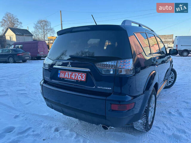Синий Мицубиси Аутлендер, объемом двигателя 2 л и пробегом 257 тыс. км за 10500 $, фото 4 на Automoto.ua