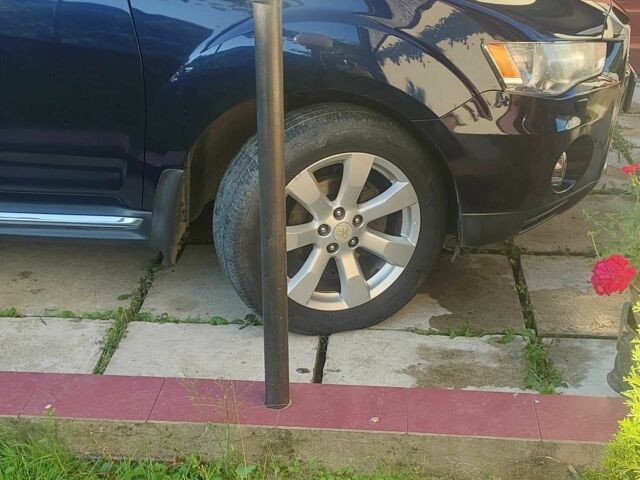 Синий Мицубиси Аутлендер, объемом двигателя 2.2 л и пробегом 295 тыс. км за 10900 $, фото 6 на Automoto.ua