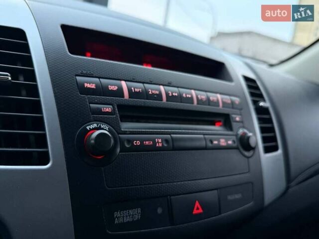 Синий Мицубиси Аутлендер, объемом двигателя 2.18 л и пробегом 289 тыс. км за 9990 $, фото 20 на Automoto.ua