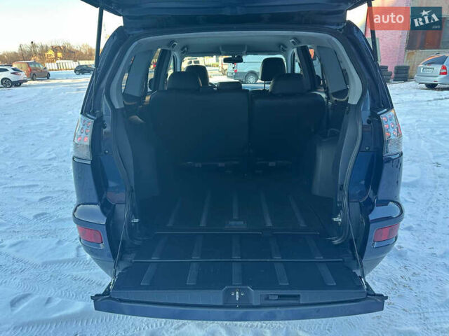 Синий Мицубиси Аутлендер, объемом двигателя 2 л и пробегом 257 тыс. км за 10500 $, фото 19 на Automoto.ua