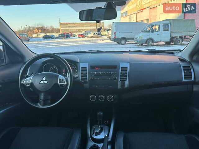 Синий Мицубиси Аутлендер, объемом двигателя 2 л и пробегом 257 тыс. км за 10500 $, фото 18 на Automoto.ua