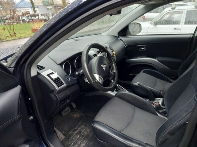 Синий Мицубиси Аутлендер, объемом двигателя 2.2 л и пробегом 220 тыс. км за 11450 $, фото 4 на Automoto.ua