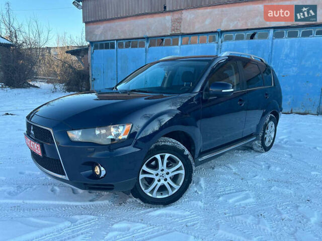 Синий Мицубиси Аутлендер, объемом двигателя 2 л и пробегом 257 тыс. км за 10500 $, фото 1 на Automoto.ua