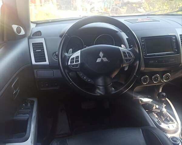 Синий Мицубиси Аутлендер, объемом двигателя 2.18 л и пробегом 223 тыс. км за 11200 $, фото 13 на Automoto.ua