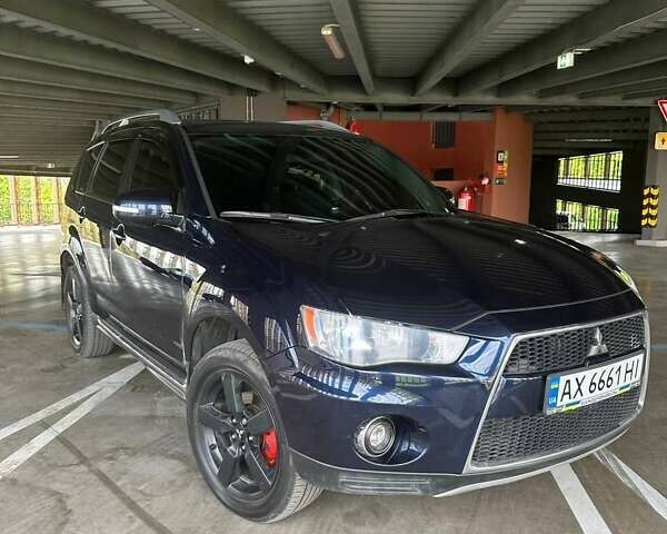 Синій Міцубісі Аутлендер, об'ємом двигуна 2.18 л та пробігом 257 тис. км за 12100 $, фото 3 на Automoto.ua